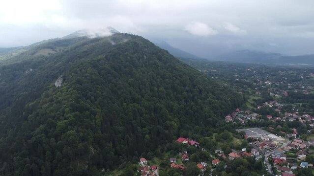 Scenic drone footage of Bran, Transylvania, Romania. Fascinating aerial views of landscape, mountains and castle.