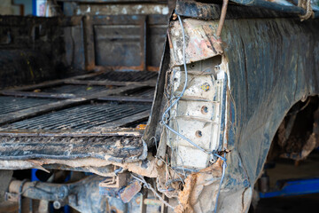 Dump truck damaged by a car accident, closeup taillight of photo,broken car tail light on picuptrack.