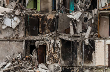 destroyed and burned houses in the city during the war in Ukraine