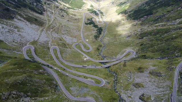 Scenic drone footage of Transfagarasan, Romania. Fascinating aerial views of landscape, mountains, rocks and road.