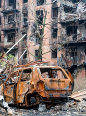 damaged and looted cars in a city in Ukraine during the war