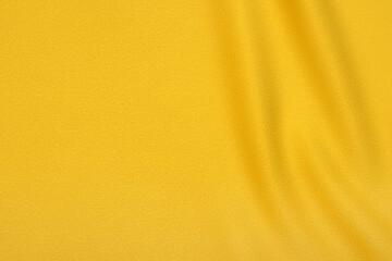 Close-up texture of natural orange or yellow fabric or cloth in same color. Fabric texture of...
