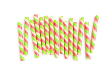 Colorful striped wafer stick rolls isolated on white background, Wafer stick rolls, Top view