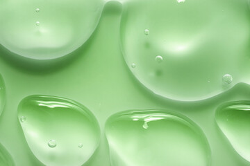 Liquid gel cosmetic smudge green drops  - obrazy, fototapety, plakaty