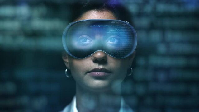 Young Serious Brunette Business Woman Working with Virtual Reality Headset. Latin American Program Developer Wearing VR Glasses, Program Code Appearing. 