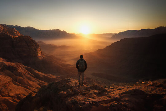 Cinematic Photo of  the Silhouette of Hiker in the Mountains
