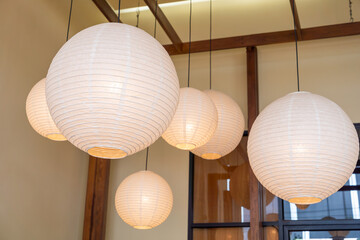 Lighting kits paper ball shape ceiling light bulbs group or Mulberry lamps set of modern interior decoration Japanese style contemporary. Japanese Lantern at restaurant. Selective Focus - Powered by Adobe