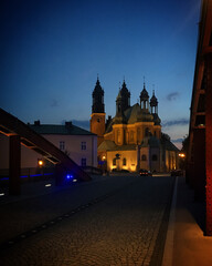 View from Jordan Bridge to Poznań Cathedral at night in Poznań, Poland, June 2019
