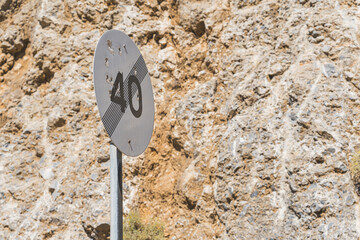 08.20.2023. Crete, Greece. A traffic sign: end maximum speed limit 40. Speed rise on road.End of 40...