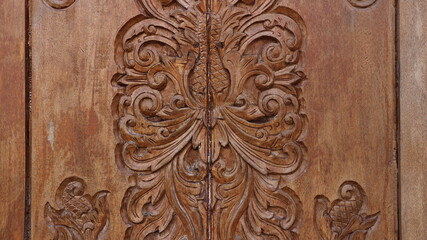 carved wooden doors on Javanese houses