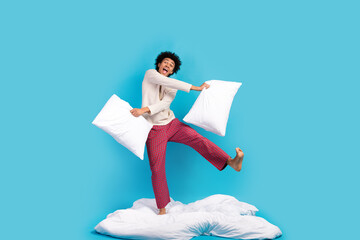 Full body portrait of positive overjoyed person dance comfy blanket arms hold cozy cushion isolated...