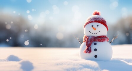 Fototapeta premium A cute snowman wearing a festive red hat and scarf