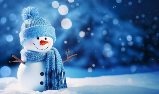 Smiling Snowman on Winter Blurred Landscape Background, Greeting Card with Copy Space