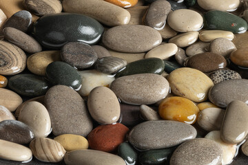 Beautiful beach stone, pebbles in water.