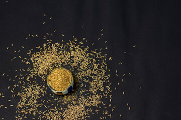 Cumin Seeds dust or Jeera Powder, Indian spices with whole jeera.