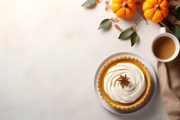 Fotobehang Top down view of fresh pumpkin pie and cup of coffee © May Thawtar