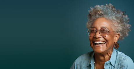 Portrait of a happy old black african woman with eyeglasses, smiling face, pensioner with white...