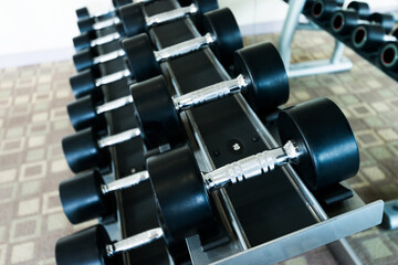 Obraz premium Rows of dumbbells in the gym