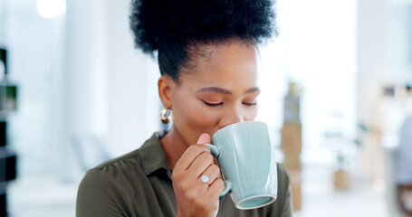 Black woman, drink and coffee break in office to relax in business, agency and company. Calm, employee and drinking cup of tea or espresso for energy, peace and motivation in professional workplace