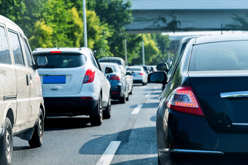 Traffic jam with row of car in a city street road