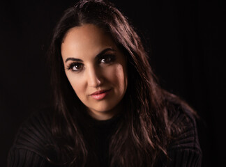 Fototapeta premium Young beautiful woman smiles at the camera