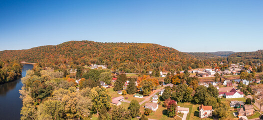 Aerial panorama of the small town of Confluence in Somerset County in Pennsylvania with fall colors...