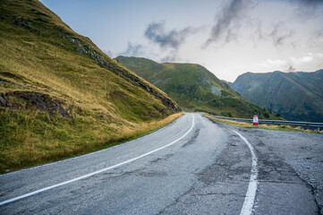 Asphalt road in a beautiful environment high in the mountains