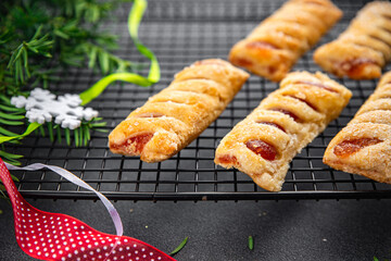 sweet christmas cookies dessert puff bun strawberry taste holiday treat new year and christmas celebration meal food snack on the table copy space food background rustic top view