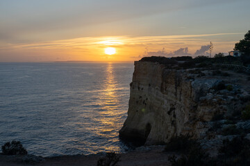 Southern coast of Portugal, cliff, sunset - obrazy, fototapety, plakaty