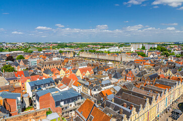 Aerial panoramic view of Arras city historical town centre, historic quarter and La Grand Place square with townhouses, skyline horizon blue sky summer day, Pas-de-Calais department, Hauts-de-France