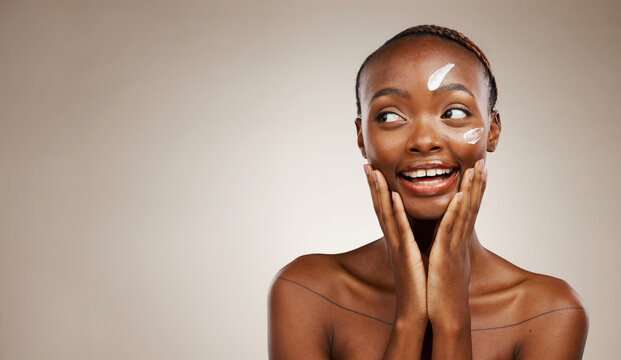 Beauty, Smile And Black Woman With Cream, Thinking Or Dermatology On A Grey Studio Background. African Person, Girl Or Model With Creme, Aesthetic Or Cosmetics With Skincare Mockup Space Or Self Care