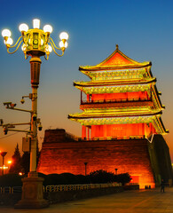 View of the historic gate in Beijing's city wall located at the south of Tiananmen Square at sunset in Beijing, China.  - 657836427