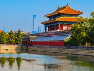 View of the Forbidden City with the reflection on the moat on a sunny day in Beijing, China. - 657837008
