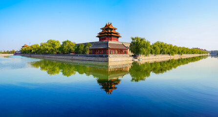 View of the Forbidden City with the reflection on the moat on a sunny day in Beijing, China. - 657837202