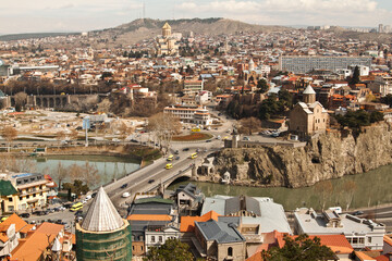 Aerial view of Old Tbilisi and cable car from Narikala Fortes. Sunny day in Tbilisi, Georgia