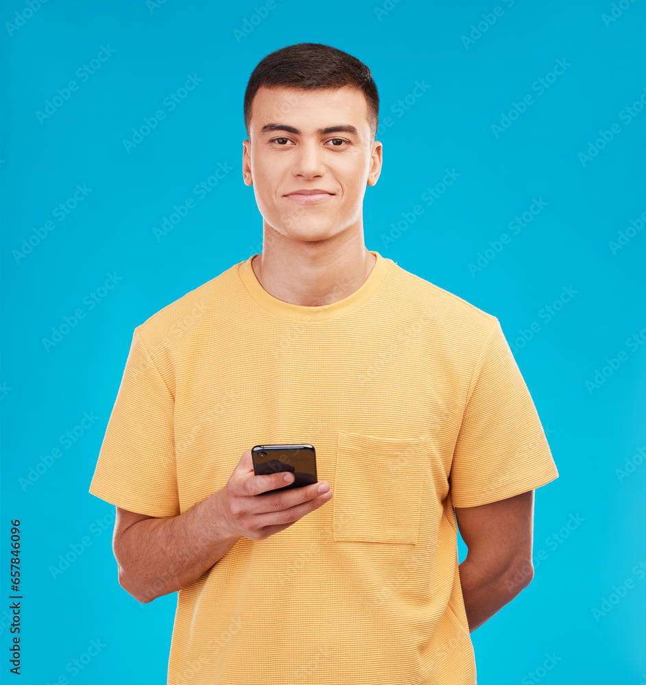 Poster phone, portrait and young man in studio networking on social media, mobile app or internet. smile, t