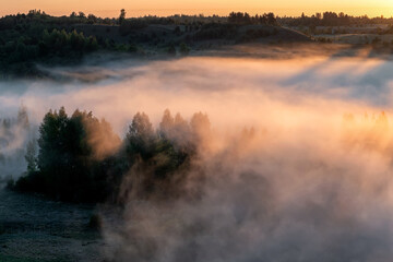 Foggy dawn in Izborsko-Malskaya valley, Pskov region