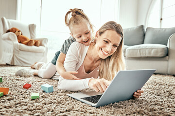 Mother, girl and laptop for home games, e learning and funny video streaming or education on carpet in living room. Excited mom, family and child play on floor on computer, kids website or internet - Powered by Adobe