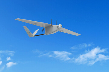 Unmanned Aerial Vehicle (UAV). Armed unmanned military drone on patrol air territory at high altitude.