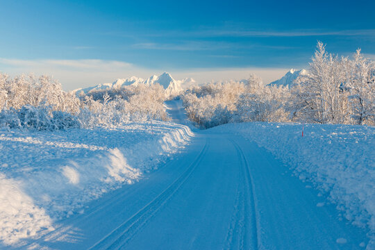 Snowy Road with Mountains in Winter, Breivikeidet, Troms, Norway
