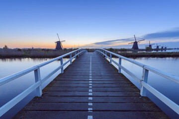 Wooden Bridge with Windmills at Dawn, Kinderdijk, South Holland, Netherlands