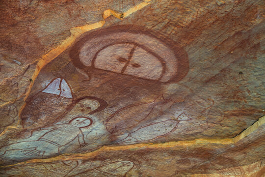 Wandjina spirit figures in a cave at Raft Point, part of the Bradshaw Rock Paintings collection of prehistoric Australian art; Kimberley, Western Australia, Australia