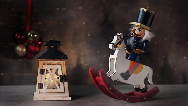 Christmas Nutcracker ride on toy wooden horse and flashlight beside