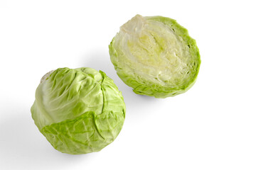 Whole and half head of cabbage isolated on white background View from above with copy space