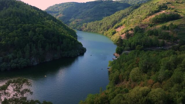 Sailing Over Minho River Near Belesar In Ribeira Sacra, Galicia, Spain. Aerial Drone Shot