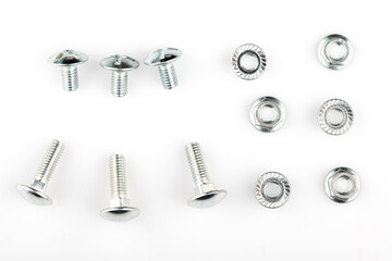 nuts and cogs isolated on white background. hex nut with slate close-up. screw with slate.