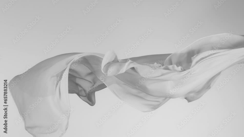 Canvas Prints Super Slow Motion of Waving Transparent Cloth. Filmed on High Speed Cinema Camera Phantom VEO 4K, 1000 fps. Isolated on White Background.