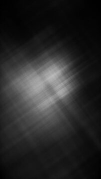 Vertical video - dark minimalist textured grayscale motion background with a diagonal crosshatch pattern. Looping and full HD abstract texture background.