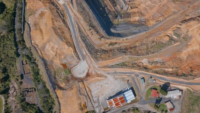 Aerial: Top down view of the Martha open cast mine in waihi, New Zealand