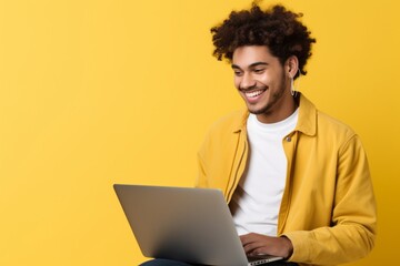 Happy Young Man Looking at Laptop, Shirt Up, and Smiling with Confidence